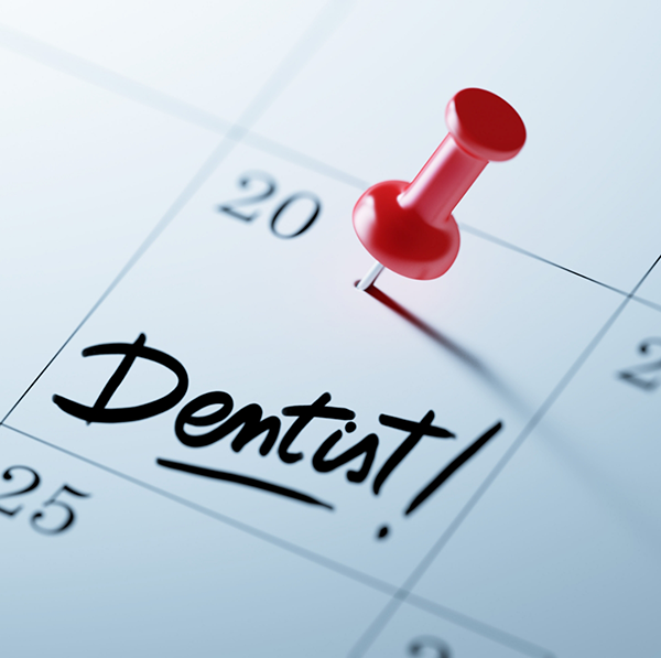 Calendar with thumbtack to mark important date